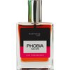 Na zdjęciu znajduje się butelka odświeżacza do samochodu o nazwie "EUPHORIA CAR Phobia Limited Edition Bad Girl 50 ml". Etykieta jest czarno-różowa z białym napisem "PHOBIA BAD GIRL" oraz "CAR FRAGRANCE".