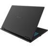Czarny laptop z otwartą pokrywą, na której widnieje logo "GIGABYTE" w kolorze tęczowym. Klawiatura jest podświetlona na niebiesko, a obudowa ma nowoczesny, minimalistyczny design.