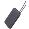 Szary powerbank z logo "AUKEY" oraz oznaczeniem pojemności "10000 mAh" na obudowie, wyposażony w dwa porty i sznurek do przenoszenia. Produkt ma zaokrąglone krawędzie i minimalistyczny design.