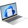 Na zdjęciu widoczny jest srebrny laptop z otwartym ekranem, na którym wyświetlany jest pulpit systemu Windows 11 z ikonami aplikacji. Na obudowie laptopa znajduje się logo producenta HP.