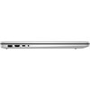 Srebrny laptop widziany z boku, z widocznymi portami: USB, HDMI, USB-C oraz gniazdem audio. Urządzenie ma smukły profil i minimalistyczny design.