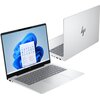 Na obrazie widoczny jest laptop z ekranem OLED, na którym wyświetlany jest interfejs systemu Windows 11 Home z ikonami aplikacji. Obudowa laptopa jest srebrna, a na pokrywie znajduje się logo producenta w postaci stylizowanych liter "hp".