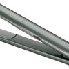 Prostownica w kolorze metalicznym z widocznymi przyciskami na obudowie. Na powierzchni znajdują się trzy małe, okrągłe wskaźniki.
