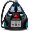 Czarny generator pary z niebieskimi akcentami, widoczny od przodu, z panelem sterowania zawierającym przyciski oznaczone jako "Eco", "Normal", "Max", "Mode", "Anti calc" oraz wskaźnik "Calc Collector". Na górze urządzenia znajduje się uchwyt z wężem parow