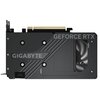 Na zdjęciu widoczna jest karta graficzna z napisem "GIGABYTE" oraz "GEFORCE RTX" na obudowie. Po prawej stronie znajduje się wentylator, a na górze widoczny jest złoty złącze PCIe.
