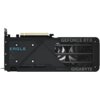 Czarna karta graficzna z widocznymi napisami: "EAGLE", "GEFORCE RTX", "GIGABYTE" oraz "RISE TO THE TOP". Karta posiada metalowy backplate z otworami wentylacyjnymi i widocznymi śrubami montażowymi.