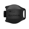 Czarny czujnik prędkości z widocznym logo "GARMIN" na powierzchni. Urządzenie ma zaokrąglony kształt z otworem na jednym końcu.