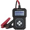Tester akumulatorów z wyświetlaczem LCD pokazującym menu z opcjami: 1. Quick Test, 2. Battery In Vehicle, 3. Out Of Vehicle, 4. Voltmeter, 5. Review Data, 6. System Setup. Obok urządzenia znajdują się dwa przewody zakończone zaciskami w kolorach czerwonym