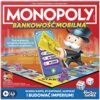 Okładka gry planszowej "Monopoly Bankowość Mobilna" przedstawia planszę z elementami gry oraz postać z wąsami trzymającą urządzenie z napisem "MONOPOLY" i wartościami pieniężnymi. Na okładce widnieją napisy: "Gra, w której inwestujesz w nieruchomości", "G