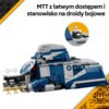 Zdjęcie przedstawia model LEGO pojazdu MTT z serii Star Wars, z widocznym mechanizmem otwierania i miejscem na droidy bojowe. Na górze zdjęcia znajduje się tekst: "MTT z łatwym dostępem i stanowisko na droidy bojowe".