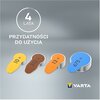 Na szarym tle znajdują się cztery baterie oznaczone kolorowymi etykietami z numerami: 10+, 312+, 13+, 675+. Nad nimi widnieją napisy: "Hg 0% BEZRTĘCIOWE", "WSPIERAJĄ KOMUNIKACJĘ BEZPRZEWODOWĄ" oraz "STABILNE NAPIĘCIE 1.45 V", a w prawym dolnym rogu znajdu