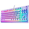 Klawiatura w kolorze lawendowym z podświetleniem RGB, na której widoczne są klawisze z oznaczeniami w języku angielskim, takimi jak "CTRL", "F9", "F10", "F11" oraz "M1" do "M6". Na obudowie znajduje się logo "steelseries", a powierzchnia klawiatury pokryt
