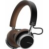 Na zdjęciu widoczne są brązowe słuchawki nauszne z metalicznymi elementami, na których pałąku znajduje się logo "beyerdynamic". Na jednej z muszli słuchawkowych widoczny jest napis "AVENTHO 100".