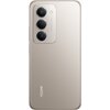 Na zdjęciu widoczny jest tył smartfona w kolorze tytanowym z trzema obiektywami aparatu i lampą błyskową. Na obudowie znajduje się napis "REDMI" oraz tekst "INNOVATIVE AI CAMERA".