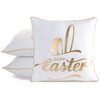 Biała poszewka z złotym napisem "Happy Easter" oraz grafiką przypominającą uszy królika. Poszewka ma złote obszycia na krawędziach.