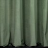 Ciemnomiętowa zasłona o gładkiej fakturze, układająca się w miękkie fałdy. Produkt to "Zasłona EUROFIRANY Rosa 140 x 250 cm Ciemnomiętowy".