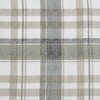 Zdjęcie przedstawia fragment materiału w kratę, w odcieniach szarości, bieli i beżu. Wzór składa się z szerokich i wąskich pasów, które krzyżują się, tworząc regularny, geometryczny układ.