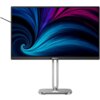 Monitor z cienkimi ramkami, wyświetlający abstrakcyjny wzór w odcieniach niebieskiego i fioletowego, umieszczony na metalowej podstawie. Na dolnej ramce widoczne jest logo "PHILIPS".