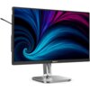 Monitor marki PHILIPS o przekątnej 23,8 cala z wyświetlaczem IPS, prezentujący dynamiczny, kolorowy wzór w odcieniach niebieskiego i fioletowego. Na dolnej ramce widoczne jest logo "PHILIPS", a monitor stoi na srebrnej podstawie.