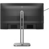 Czarny monitor z logo PHILIPS na środku tylnej obudowy, zamontowany na srebrnej podstawie o nowoczesnym designie. Monitor posiada prostokątną obudowę z widocznymi portami i złączami na dolnej krawędzi.