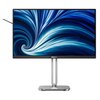 Monitor marki Philips z cienką ramką, wyświetlający dynamiczny, niebieski wzór przypominający wir. Na dolnej ramce widoczne jest logo "PHILIPS".