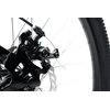 Zdjęcie przedstawia zbliżenie na tylną część roweru górskiego, ukazującą mechanizm hamulca tarczowego oraz fragment ramy i szprychy koła. Na zacisku hamulca widoczny jest napis "290" oraz "ARTEK MAX".
