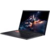 Na zdjęciu widoczny jest laptop z otwartym ekranem, na którym wyświetlany jest obraz przedstawiający statek kosmiczny unoszący się nad chmurami w przestrzeni kosmicznej. Klawiatura laptopa jest podświetlona, a na obudowie znajdują się porty USB i gniazdo 