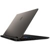Na zdjęciu widoczny jest otwarty laptop z metaliczną obudową, na której znajduje się logo producenta. Klawiatura laptopa jest podświetlona kolorowymi światłami.
