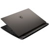 Na zdjęciu widoczny jest laptop z zamkniętą pokrywą, na której znajduje się logo producenta. Laptop ma ciemną obudowę i widoczne są porty oraz otwory wentylacyjne na krawędzi.