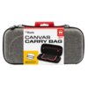 Szare etui na konsolę z widocznym logo "Blade" oraz napisem "Canvas Carry Bag" na opakowaniu, które przedstawia również grafikę otwartego etui z czerwonymi akcentami. Na opakowaniu znajduje się informacja, że produkt jest przeznaczony dla "Switch 2", "Swi