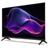 Na zdjęciu widoczny jest telewizor z cienką ramką, wyświetlający abstrakcyjny, kolorowy wzór w odcieniach fioletu i różu na czarnym tle. Na dolnej ramce telewizora znajduje się logo "SHARP".