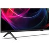 Telewizor z cienką ramką i nowoczesnym designem, wyświetlający kolorowe, abstrakcyjne wzory na ekranie. Na dolnej ramce widoczne są napisy "AQUOS" i "SHARP".