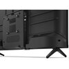 Tył telewizora z widocznymi portami HDMI, USB oraz innymi złączami, zamontowany na dwóch nóżkach. Na obudowie znajduje się ostrzeżenie w języku angielskim oraz otwory wentylacyjne.