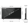 Telewizor marki SHARP o przekątnej ekranu 55 cali (139 cm) z widocznymi wymiarami: szerokość 122,6 cm, wysokość 71,3 cm, głębokość 8,4 cm, szerokość podstawy 101,2 cm, wysokość z podstawą 77,1 cm, głębokość z podstawą 26,0 cm. Na ekranie widnieje napis "S