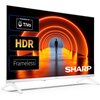 Telewizor z wyświetlaczem pokazującym osobę w tunelu oświetlonym pomarańczowymi światłami, z widocznymi napisami: "Powered by TiVo", "HDR", "Frameless" oraz logo "SHARP".
