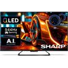 Telewizor z wyświetlaczem prezentującym dynamiczny obraz sportowego samochodu w intensywnych kolorach, z widocznymi napisami: "QLED", "144Hz Gaming", "A.I. picture processing" oraz logo "SHARP". Na ekranie znajdują się także elementy graficzne, takie jak 