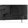 Tył telewizora z widocznymi portami i złączami, w tym HDMI i USB, na ciemnej obudowie. Telewizor stoi na metalowych nóżkach, a powierzchnia obudowy ma wyraźne linie i krawędzie.