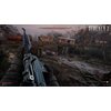 Na obrazie widoczny jest ekran z gry "S.T.A.L.K.E.R. 2: Serce Czarnobyla", przedstawiający postać trzymającą broń, skierowaną w stronę zniszczonego mostu z opuszczonymi wagonami kolejowymi. W prawym górnym rogu znajduje się logo gry z napisem "S.T.A.L.K.E