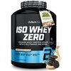 Czarny pojemnik z odżywką białkową marki BioTechUSA, oznaczony jako "ISO WHEY ZERO", o smaku "Cookies & Cream", z informacjami: "Lactose Reduced", "Sugar Free", "Gluten Free", "Palm Oil Free", oraz "1816 grams (72 servings)". Obok pojemnika widoczne są ci