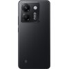 Czarny smartfon z dwoma dużymi obiektywami aparatu i lampą błyskową umieszczonymi w prostokątnym module. Na module widoczny jest napis "POCO" oraz "50MP AI CAMERA", a na dole obudowy znajduje się symbol "5G".