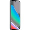 Smartfon z dużym ekranem, na którym wyświetlany jest kolorowy gradient. Na górze ekranu widoczna jest mała kamera przednia.