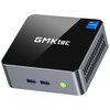 Na zdjęciu znajduje się kompaktowy komputer z logo "GMKtec" na górnej powierzchni obudowy. Na obudowie widoczny jest również napis "intel CORE i5", dwa porty USB oraz okrągły przycisk z zielonym podświetleniem.