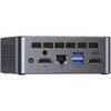 Na zdjęciu znajduje się tył komputera z kilkoma portami, w tym HDMI, Ethernet, dwa porty USB, port USB typu C oraz gniazdo zasilania oznaczone jako "DC". Widoczne są również otwory wentylacyjne w górnej części urządzenia.