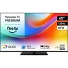 Telewizor z kolorowym ekranem wyświetla informacje: "Panasonic TV PREMIUM", "fire tv", "65”", "120 Hz", "NEW", oraz ikony i napisy: "QLED", "HCX PROCESSOR", "Dolby VISION·ATMOS", "GAME MODE EXTREME".
