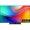 Telewizor z kolorowym ekranem wyświetlającym gradientowe przejścia od zieleni przez niebieski, pomarańczowy do czerwonego, z widocznym napisem "4K QLED" w czarnym prostokącie. Na dolnej ramce telewizora znajduje się logo "Panasonic".