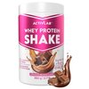 Biały pojemnik z różową etykietą zawiera napisy: "ACTIVLAB Whey Protein Shake", "Chocolate Delicious Flavour", "350 g | 0.7 lb", "17 g Protein x 10 portions", "3x Laboratory Tested", "Measuring Scoop Inside", "Lactose Free". Na etykiecie widoczna jest gra