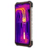 Smartfon z pomarańczową obudową wyświetla obraz termowizyjny z temperaturą 48°C, przedstawiający elementy elektryczne. Na boku urządzenia widoczny jest napis "WATERPROOF".