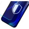 Na zdjęciu widoczny jest fragment ekranu telefonu z nałożonym szkłem ochronnym, na którym znajduje się grafika tarczy. Tło ekranu ma niebieski wzór z białymi kropkami i falami.