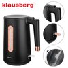 Czajnik elektryczny w kolorze czarnym z elementami w odcieniu różowego złota, umieszczony na tle opakowania. Na opakowaniu widnieje napis: "klausberg ELECTRIC KETTLE", "HIGH QUALITY STAINLESS STEEL", "1.7 l", "ROSE GOLD KB-7889".