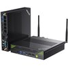 Na zdjęciu widoczny jest czarny komputer z logo "GMKTEC" na obudowie, wyposażony w różne porty, w tym USB, HDMI i Ethernet, oraz dwie anteny. Obok znajduje się pionowo ustawiona jednostka z dodatkowymi portami i logo "GMKTEC" na boku.